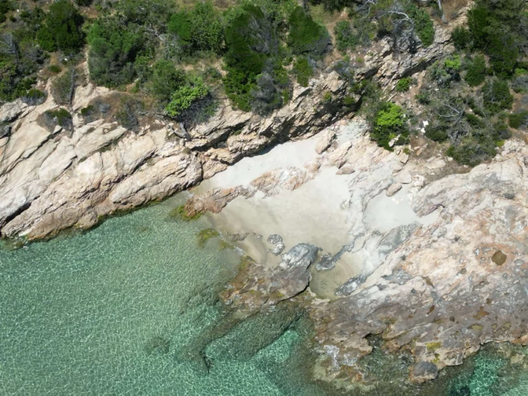 Small sandy beach in the nude section at Paradise Beach Thasos