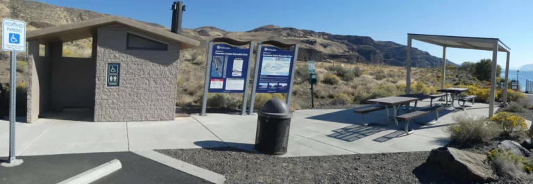 A single bathroom and some picnic tables are the only facilities here at Vantage Beach