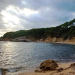 Cloudy conditions are common here late in the afternnon at Cala Estreta