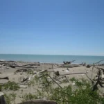 The beach gets larger and water levels lower as summer progresses