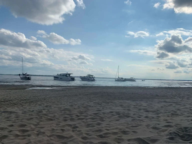 Taking a boating and anchoring at Oka Beach is a popular option