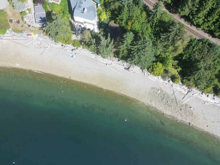 The nude section is to the right (left when looking at the beach)