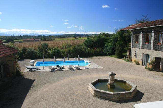 Clothing optional pool area at Naturist Hotel Peyraille